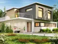 Casa moderna con esterno grigio e beige, auto elettrica in carica. Un'ispirazione per scegliere colore casa esterno.