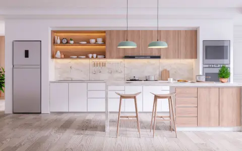Cucine in cartongesso moderne con isola centrale, elettrodomestici integrati e finiture in legno chiaro.