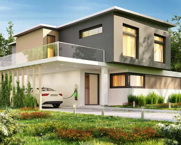 Casa moderna con esterno grigio e beige, auto elettrica in carica. Un'ispirazione per scegliere colore casa esterno.
